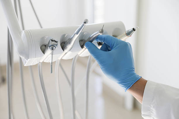 Professional Tooth Extraction technician working in Garner, IA